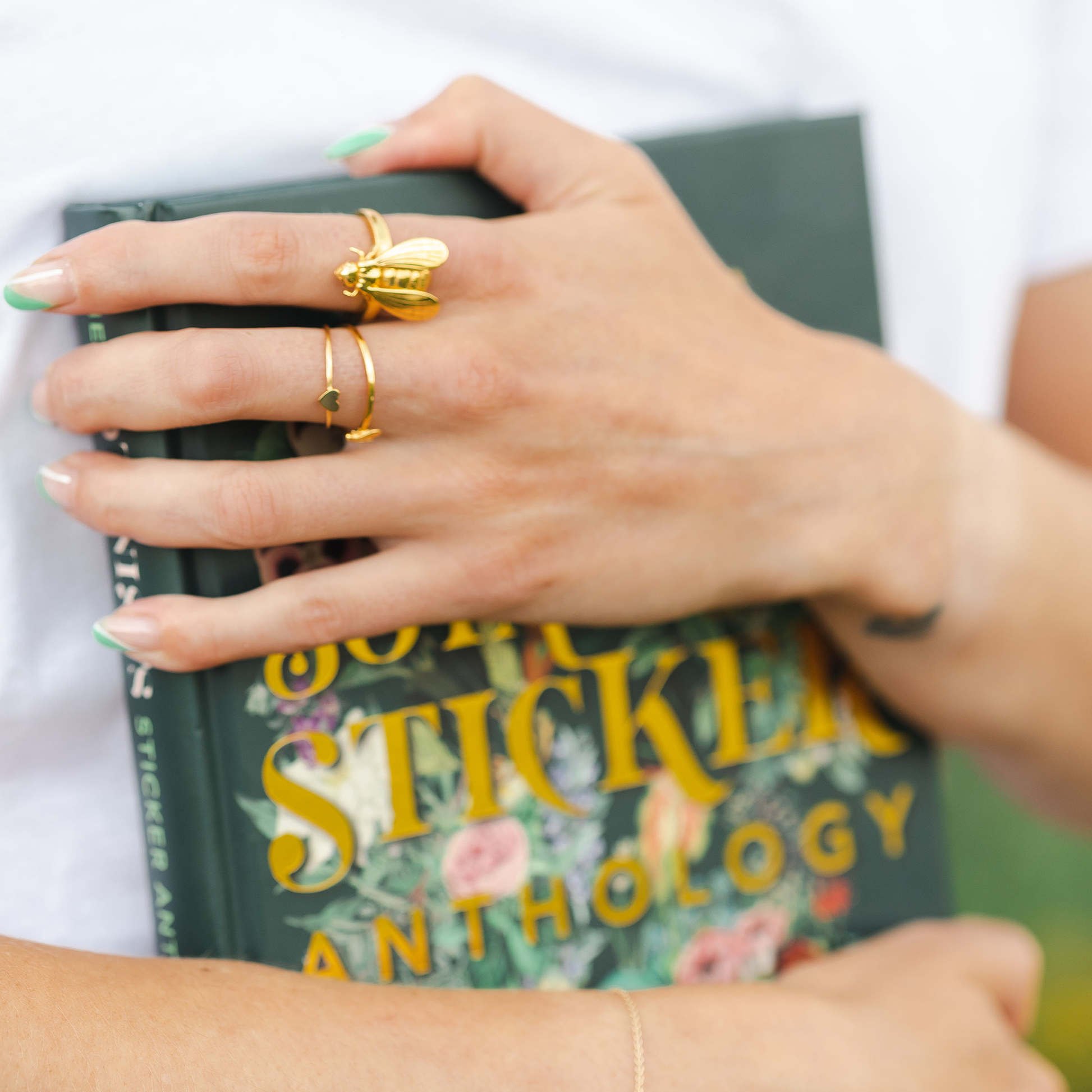 wearing bee pinky ring
