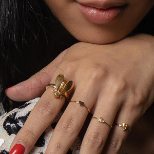 wearing gold bee ring