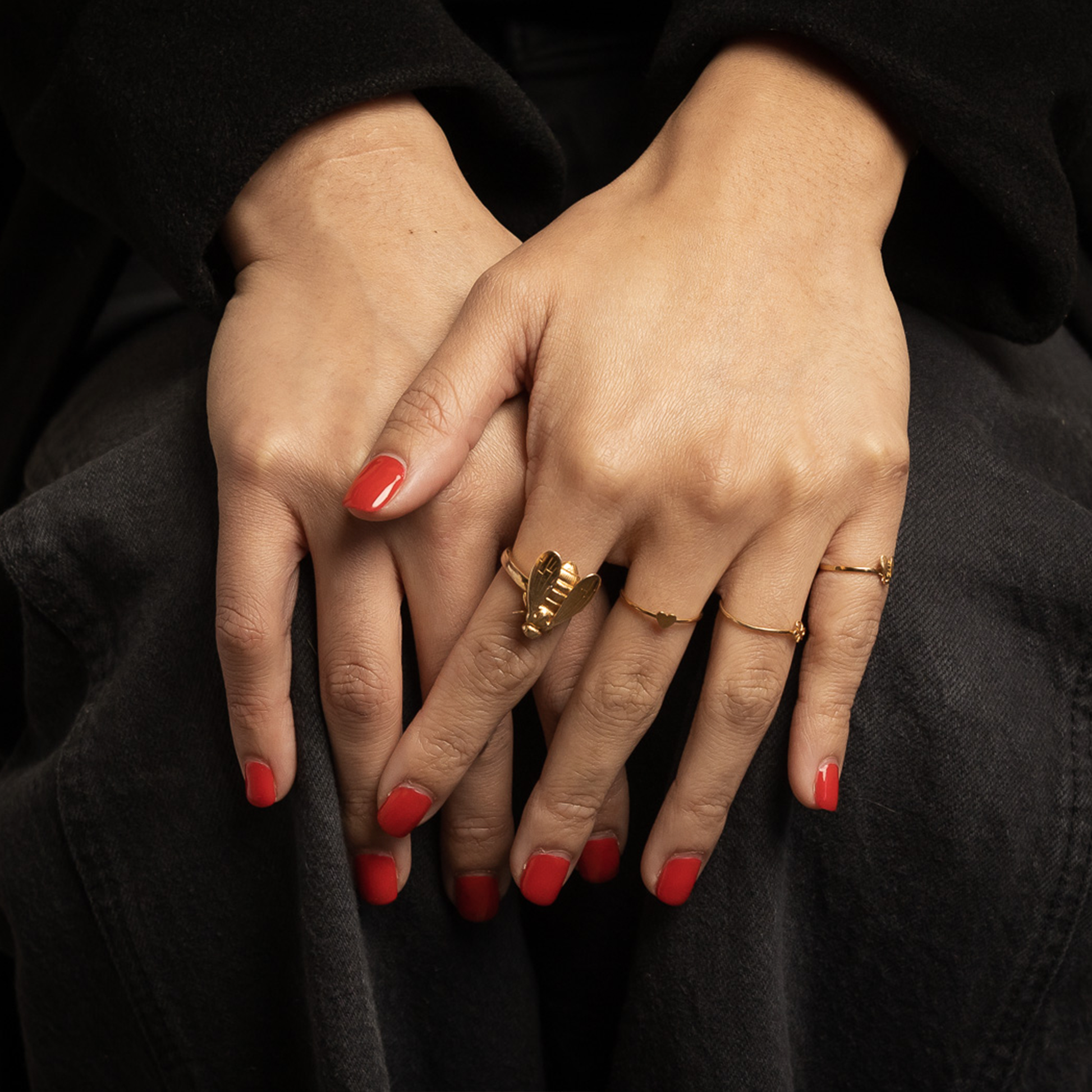 wearing gold bee ring